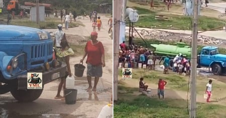 Cubanos corren detrás de una pipa de agua en Santiago de Cuba