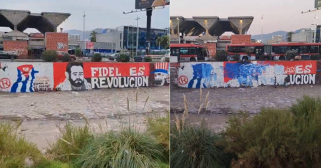Cubanos borran mural pro-dictadura cubana en Santiago de Chile