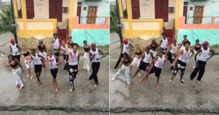 ¡Ni el aguacero los paró! Jóvenes cubanos descalzos bailan reparto bajo la lluvia en una calle de Cuba