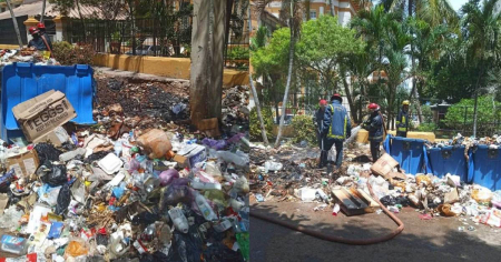 Los CDR vigilan las cuadras... pero no la montaña de basura que arde junto a su sede en el Vedado