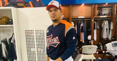 Alberto Dias in a baseball ‍uniform