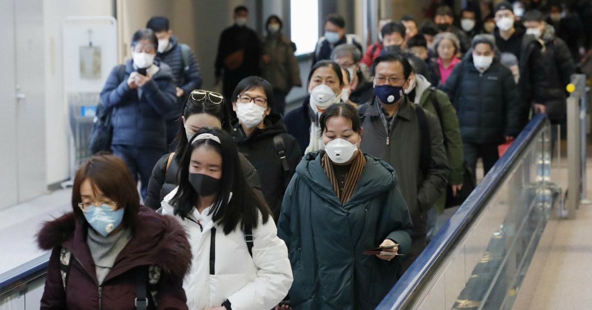 Personas en un aeropuerto de Japón. © Kyodo / vía REUTERS