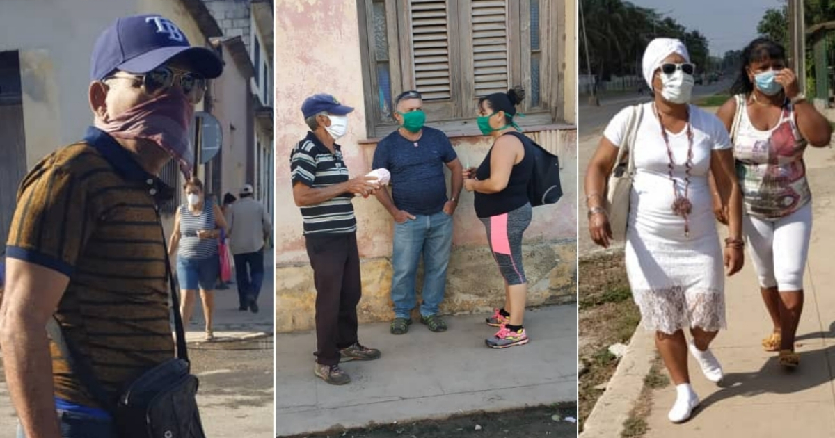 Cubanos con nasobucos en La Habana ante el coronavirus. © CiberCuba