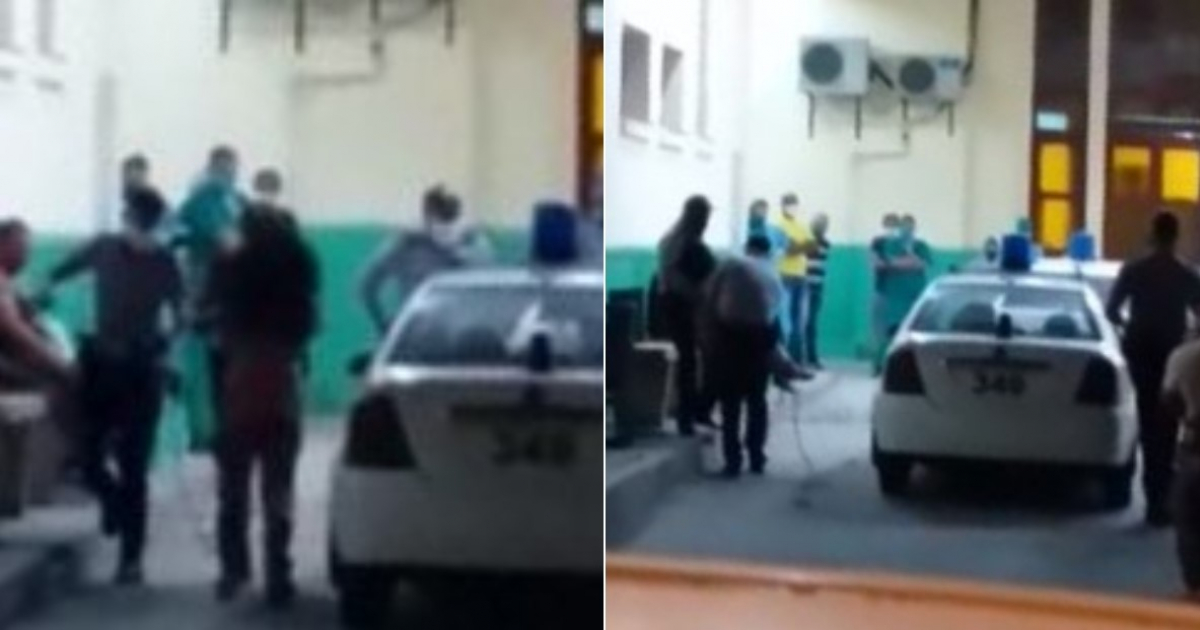 Varios agentes de policia amarran a una mujer en Cuba © Captura de vídeo / Facebook / Yusnaby Pérez