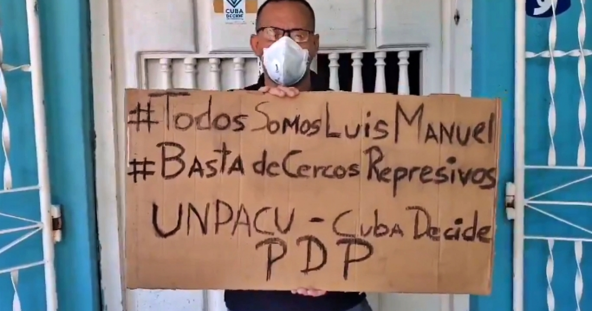 José Daniel Ferrer muestra un cartel en solidaridad con Luis Manuel Otero © Twitter / José Daniel Ferrer