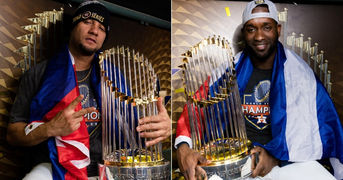 Yulieski Gurriel y Yordan Álvarez con trofeo de Serie Mundial © Twitter / MLB Cuba 