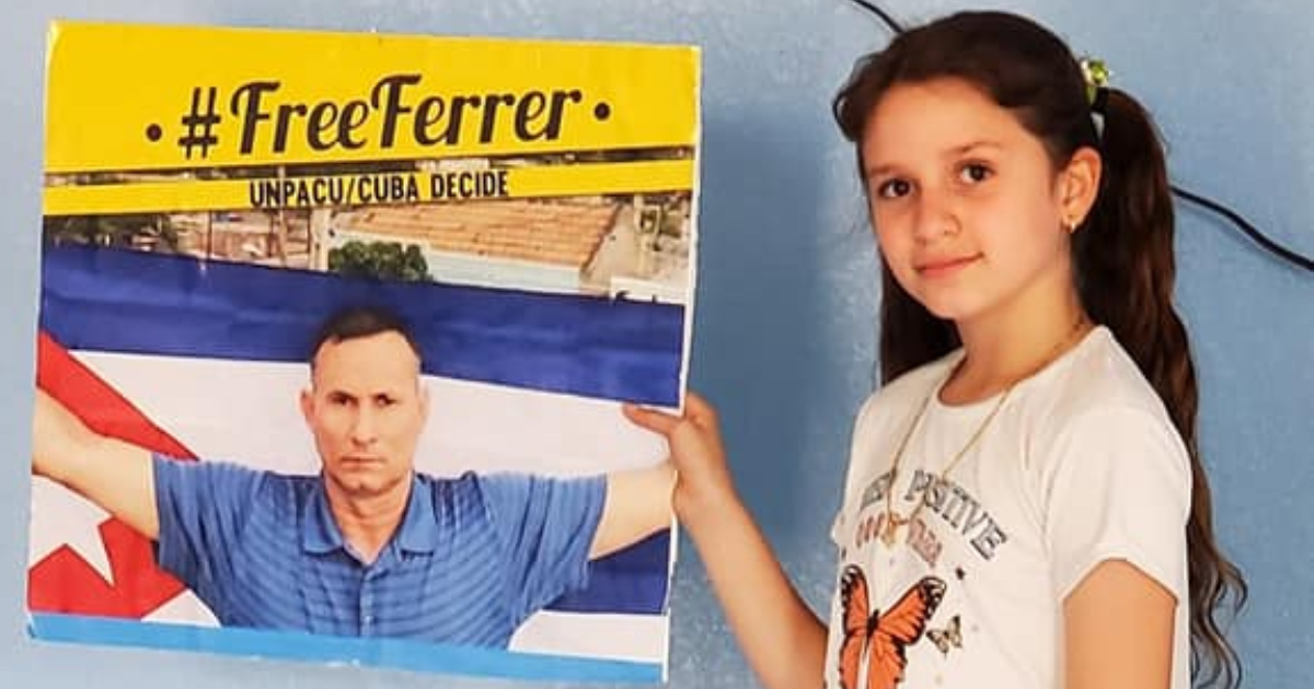 José Daniel Ferrer (cartel) y su sobrina © Facebook José Daniel Ferrer