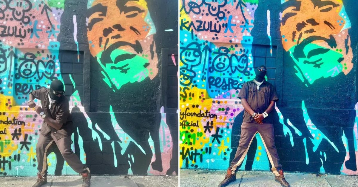 Chocolate Mc junto a un mural de Bob Marley © Instagram / Chocolate MC