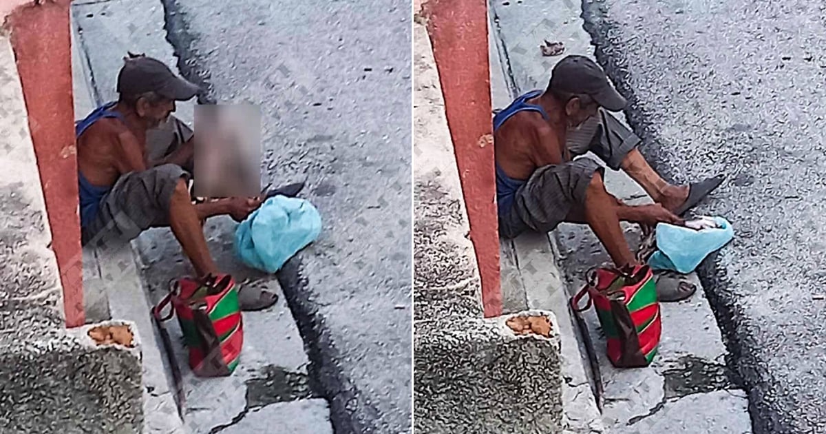 Man Dismembers Cat on Santiago de Cuba Street