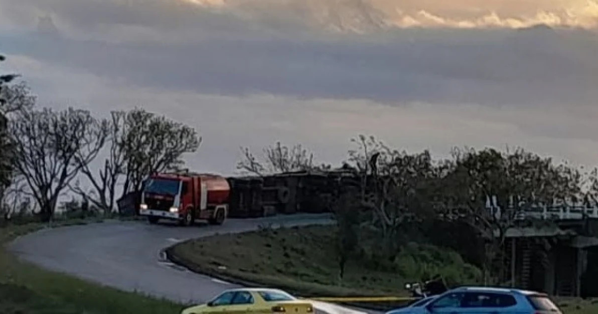 Truck Overturns on Havana Bridge