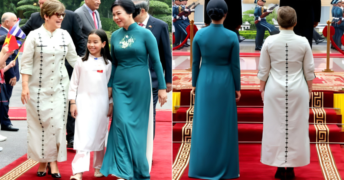 Lis Cuesta Peraza vestida con un atuendo de estilo guayabera en un acto oficial en Vietnam.