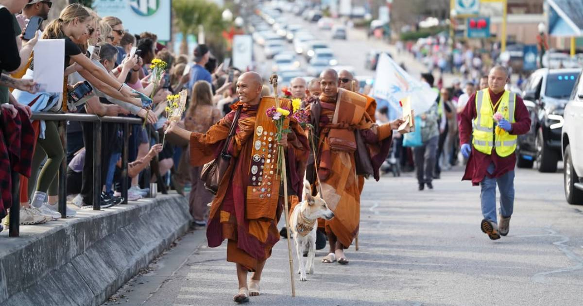 Buddhist monks and their dog Aloka are traversing the United States on a walk for peace