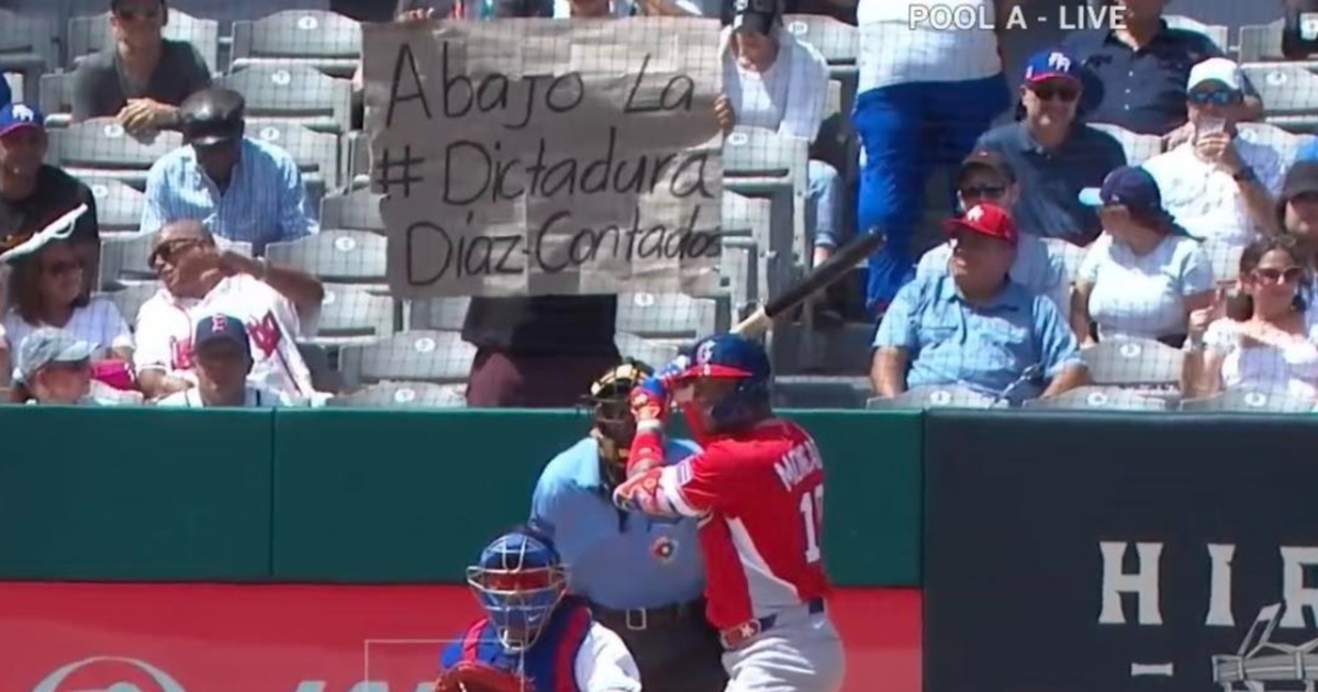 Protest Sign Against Cuban Regime Interrupts Cuba's World Baseball Classic Game Broadcast