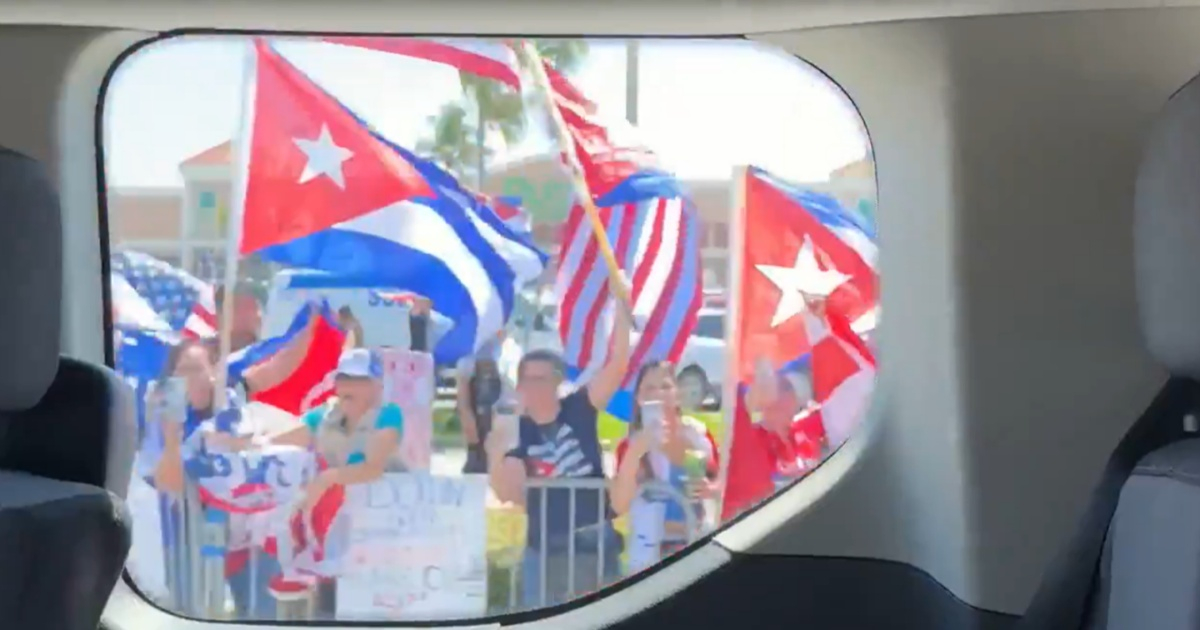 Trump's Motorcade Slows Down Near Protesters Demanding Freedom for Cuba in Florida