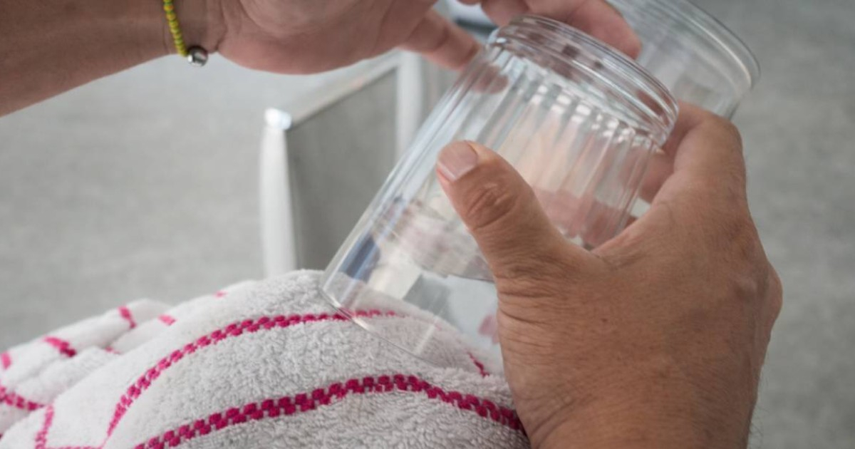 "Unique Headache Remedy: Cuban Man Demonstrates 'Sun Extraction' Technique"