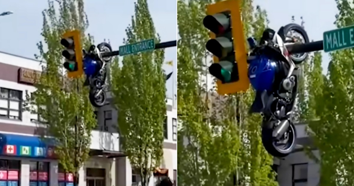Unbelievable Video: Motorcycle Ends Up on Traffic Light Post After Collision in Canada