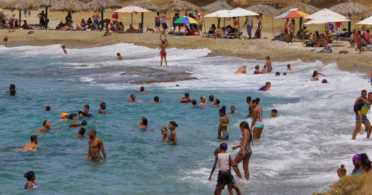 Shark Sighting Near Swimmers at Siboney Beach, Santiago de Cuba