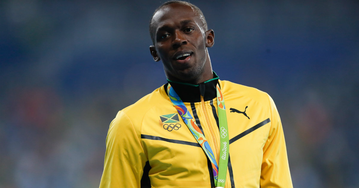 Bolt recibiendo una medalla de oro en los pasados Juegos Olímpicos © Wikipedia