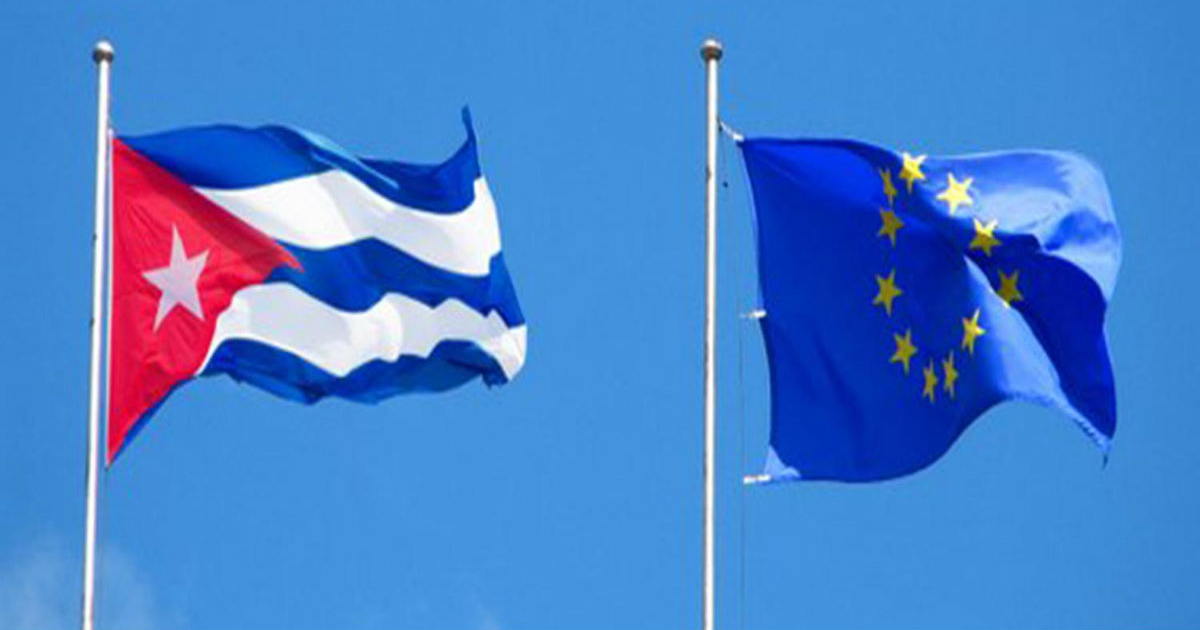 Las banderas de Cuba y la Unión Europea ondeando en lo alto © @CubaMINREX